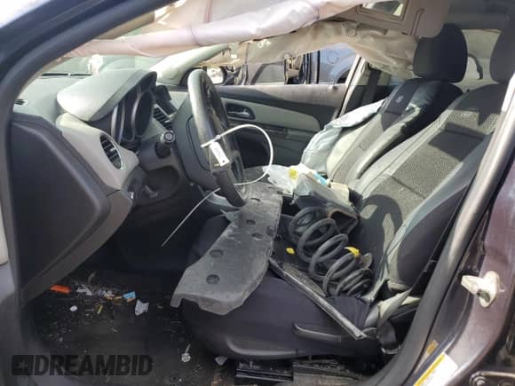 2014 Chevrolet Cruze LS z VIN 1G1PA5SH2E7330855, wystawiony jako Copart lot #84036265 z przebiegiem Nie podano mil oraz Szkoda całkowita • Salvage title. Historia ofert i sprzedaży dostępna na DreamBid. Obrazek 7.