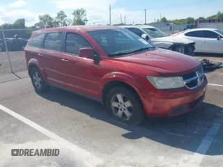 2009 Dodge Journey SXT with VIN 3D4GG57V99T139989, listed as a IAAI auction lot 43140060 with 199,256 mi miles and . Bid and sale history available at DreamBid. Image 1.