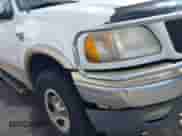 2000 Ford F-150 XL with VIN 1FTRX18L5YNA04731, listed as a IAAI auction lot 43348989 with Not provided miles and . Bid and sale history available at DreamBid. Image 6.