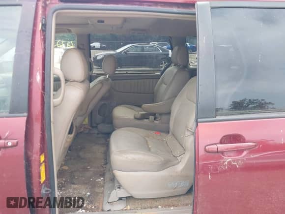 2007 Toyota Sienna XLE z VIN 5TDZK22C47S024913, wystawiony jako IAAI lot #43293292 z przebiegiem Nie podano mil oraz . Historia ofert i sprzedaży dostępna na DreamBid. Obrazek 8.