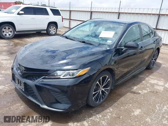 2020 Toyota Camry SE with VIN 4T1G11AK2LU907813, listed as a IAAI auction lot 42652252 with 90,675 mi miles and . Bid and sale history available at DreamBid. Image 2.