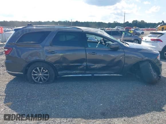 2017 Dodge Durango SXT z VIN 1C4RDJAGXHC741117, wystawiony jako IAAI lot #43112726 z przebiegiem 96 030 mil mil oraz . Historia ofert i sprzedaży dostępna na DreamBid. Obrazek 13.