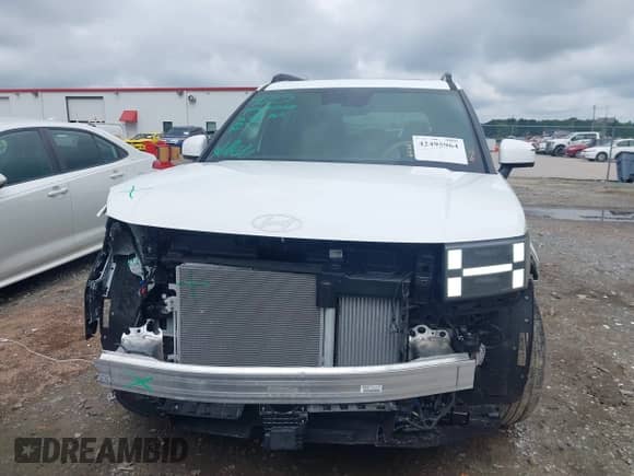 2025 Hyundai Santa Fe Limited z VIN 5NMP44GLXSH088830, wystawiony jako IAAI lot #42495964 z przebiegiem 1 216 mil mil oraz . Historia ofert i sprzedaży dostępna na DreamBid. Obrazek 13.