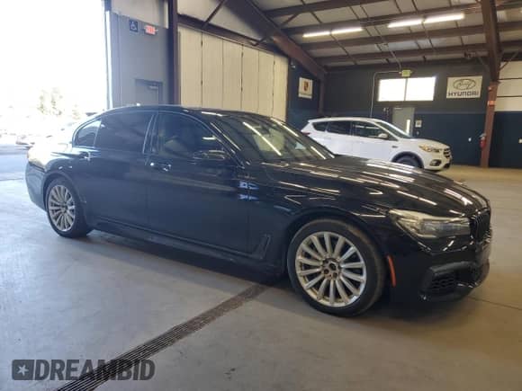 2019 BMW 7 Series 740i xDrive with VIN WBA7E4C56KGV70560, listed as a Copart auction lot 86064145 with 277,053 mi miles and Clean title. Bid and sale history available at DreamBid. Image 4.
