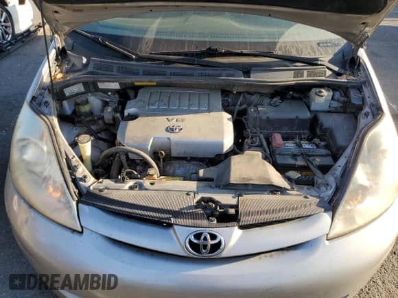 2010 Toyota Sienna CE z VIN 5TDKK4CC2AS334058, wystawiony jako Copart lot #67028095 z przebiegiem 206 076 mil mil oraz Szkoda całkowita • Salvage title. Historia ofert i sprzedaży dostępna na DreamBid. Obrazek 12.