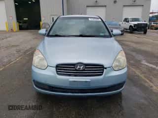 2007 Hyundai Accent GLS z VIN KMHCN46CX7U132172, wystawiony jako Copart lot #61669064 z przebiegiem 220 897 mil mil oraz Szkoda całkowita • Salvage title. Historia ofert i sprzedaży dostępna na DreamBid. Obrazek 5.