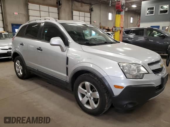 2012 Chevrolet Captiva Sport LS with VIN 3GNAL2EK4CS591729, listed as a Copart auction lot 77488834 with 182,738 mi miles and Salvage title. Bid and sale history available at DreamBid. Image 4.