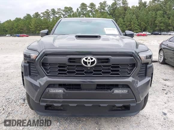 2024 Toyota Tacoma TRD Off Road with VIN 3TMLB5JN9RM060836, listed as a IAAI auction lot 43181595 with 21,563 mi miles and . Bid and sale history available at DreamBid. Image 13.