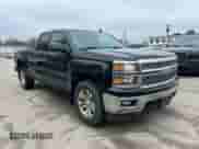 2014 Chevrolet Silverado 1500 LT z VIN 1GCVKREH1EZ169899, wystawiony jako IAAI lot #42143501 z przebiegiem 124 789 mil mil oraz . Historia ofert i sprzedaży dostępna na DreamBid. Obrazek 1.