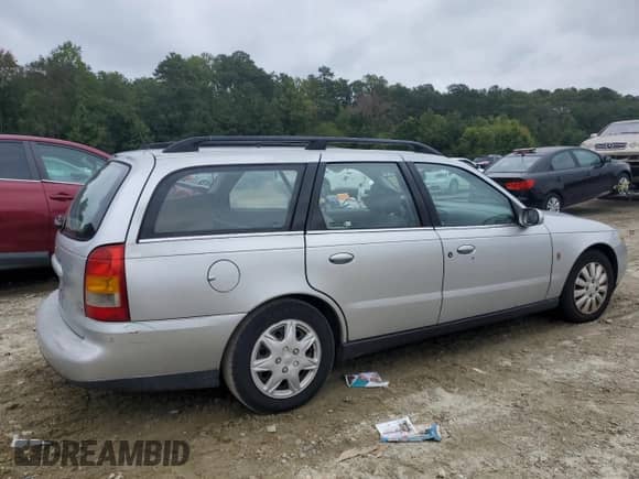 2001 Saturn LW with VIN 1G8JU82F71Y577940, listed as a Copart auction lot 71680985 with 233,817 mi miles and Salvage title. Bid and sale history available at DreamBid. Image 3.