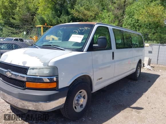 2003 Chevrolet Express Passenger with VIN 1GAHG39U331116872, listed as a IAAI auction lot 42273134 with 70,473 mi miles and . Bid and sale history available at DreamBid. Image 2.
