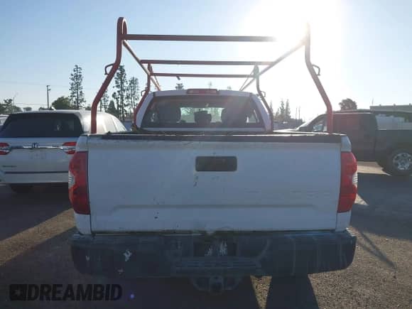 2016 Toyota Tundra SR5 with VIN 5TFRM5F10GX104885, listed as a IAAI auction lot 43454218 with 214,362 mi miles and . Bid and sale history available at DreamBid. Image 17.