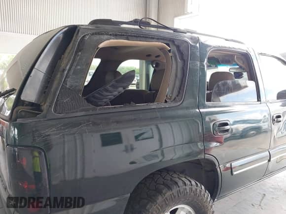 2002 Chevrolet Tahoe Z71 z VIN 1GNEK13ZX2R150624, wystawiony jako IAAI lot #42144745 z przebiegiem 345 288 mil mil oraz . Historia ofert i sprzedaży dostępna na DreamBid. Obrazek 6.