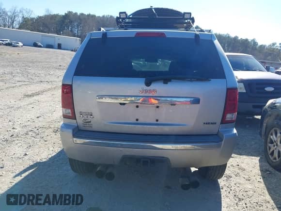 2009 Jeep Grand Cherokee with VIN 1J8HR68T39C540795, listed as a IAAI auction lot 41379112 with 236,624 mi miles and . Bid and sale history available at DreamBid. Image 16.