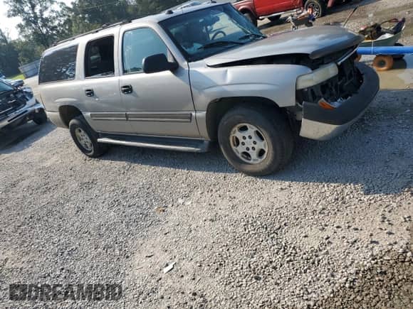 2005 Chevrolet Suburban LS with VIN 3GNEC16Z95G159375, listed as a Copart auction lot 65865884 with 290,671 mi miles and Salvage title. Bid and sale history available at DreamBid. Image 4.
