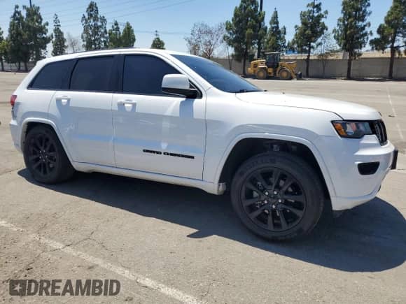 2019 Jeep Grand Cherokee Laredo E with VIN 1C4RJEAG6KC832957, listed as a Copart auction lot 68135325 with 110,826 mi miles and Salvage title. Bid and sale history available at DreamBid. Image 4.