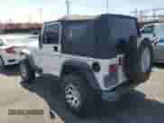 1999 Jeep Wrangler Sport z VIN 1J4FY19S3XP460794, wystawiony jako Copart lot #84594705 z przebiegiem 211 690 mil mil oraz Szkoda całkowita • Salvage title. Historia ofert i sprzedaży dostępna na DreamBid. Obrazek 2.