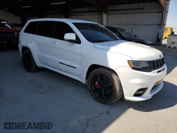 2020 Jeep Grand Cherokee SRT with VIN 1C4RJFDJ8LC114003, listed as a Copart auction lot 70252325 with 52,457 mi miles and Clean title. Bid and sale history available at DreamBid. Image 4.