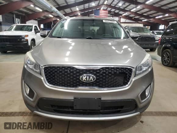 2016 Kia Sorento EX with VIN 5XYPHDA1XGG023327, listed as a Copart auction lot 90457995 with 217,489 mi miles and Clean title. Bid and sale history available at DreamBid. Image 5.