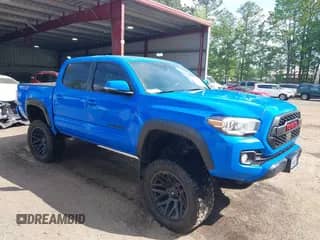 2021 Toyota Tacoma SR with VIN 3TMCZ5AN2MM425121, listed as a IAAI auction lot 42182136 with 24,119 mi miles and . Bid and sale history available at DreamBid. Image 1.