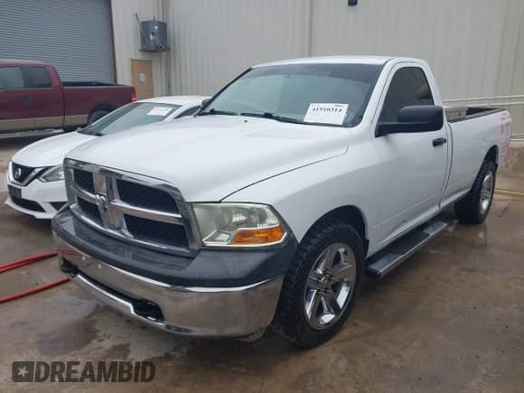 2012 Ram 1500 ST z VIN 3C6JD6DP9CG201129, wystawiony jako IAAI lot #41910314 z przebiegiem 257 828 mil mil oraz . Historia ofert i sprzedaży dostępna na DreamBid. Obrazek 2.