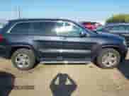 2013 Jeep Grand Cherokee Limited z VIN 1C4RJFBG4DC648995, wystawiony jako IAAI lot #43338050 z przebiegiem 138 551 mil mil oraz . Historia ofert i sprzedaży dostępna na DreamBid. Obrazek 13.