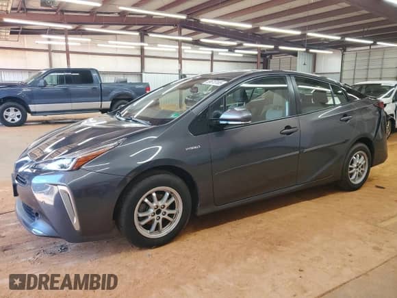 2020 Toyota Prius LE with VIN JTDL9RFU3L3017282, listed as a Copart auction lot 69615185 with 100,570 mi miles and Salvage title. Bid and sale history available at DreamBid. Image 1.