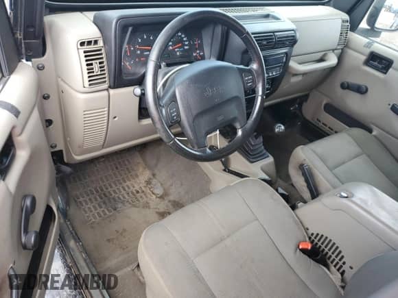 2003 Jeep Wrangler Sahara с VIN 1J4FA59S73P308250, выставлен на аукционе Copart как лот 64305965 с пробегом 186 288 миль миль и Чистый • Clean title. История ставок и продаж доступна на DreamBid. Изображение 8.