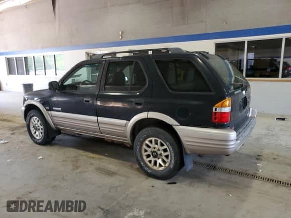 2001 Honda Passport LX с VIN 4S6DM58W614408494, выставлен на аукционе Copart как лот 54152645 с пробегом 102 628 миль миль и Чистый • Clean title. История ставок и продаж доступна на DreamBid. Изображение 2.