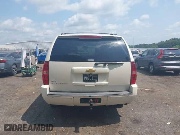 2013 Chevrolet Suburban LTZ with VIN 1GNSCKE0XDR322898, listed as a IAAI auction lot 42279704 with 213,429 mi miles and . Bid and sale history available at DreamBid. Image 16.