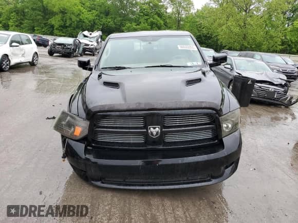2012 Ram 1500 Sport with VIN 1C6RD7HT0CS345113, listed as a Copart auction lot 56533355 with 146,767 mi miles and Salvage title. Bid and sale history available at DreamBid. Image 5.