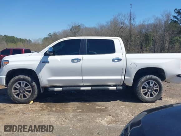 2019 Toyota Tundra SR5 with VIN 5TFAY5F14KX803995, listed as a IAAI auction lot 41720938 with 151,411 mi miles and . Bid and sale history available at DreamBid. Image 15.