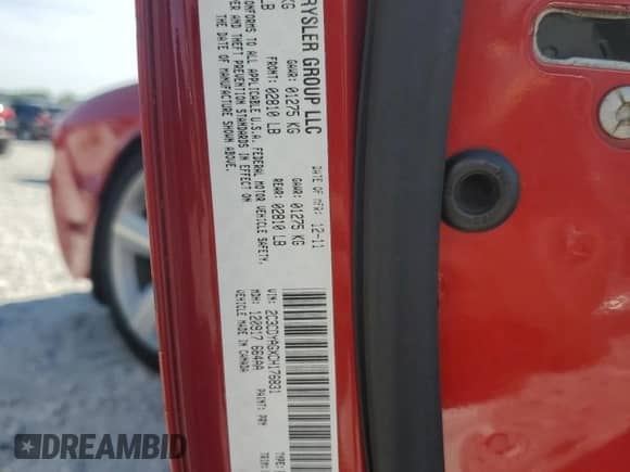 2012 Dodge Challenger SXT z VIN 2C3CDYAGXCH176831, wystawiony jako Copart lot #70942105 z przebiegiem 156 131 mil mil oraz Szkoda całkowita • Salvage title. Historia ofert i sprzedaży dostępna na DreamBid. Obrazek 13.