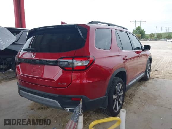 2023 Honda Pilot Elite z VIN 5FNYG1H84PB039720, wystawiony jako IAAI lot #42429896 z przebiegiem 37 988 mil mil oraz . Historia ofert i sprzedaży dostępna na DreamBid. Obrazek 4.