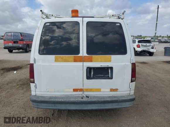 2001 Chevrolet Astro Cargo с VIN 1GCDM19W61B141888, выставлен на аукционе Copart как лот 45130465 с пробегом Не указан миль и Списание • Salvage title. История ставок и продаж доступна на DreamBid. Изображение 6.