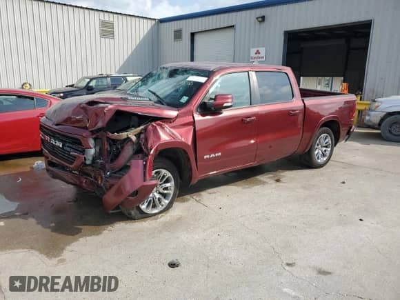 2020 Ram 1500 Laramie z VIN 1C6RREJT1LN107804, wystawiony jako Copart lot #56931785 z przebiegiem Nie podano mil oraz Szkoda całkowita • Salvage title. Historia ofert i sprzedaży dostępna na DreamBid. Obrazek 1.