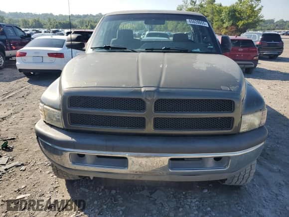 1996 Dodge 2500 with VIN 1B7KF23C1TJ123975, listed as a Copart auction lot 65028055 with 156,028 mi miles and Salvage title. Bid and sale history available at DreamBid. Image 5.