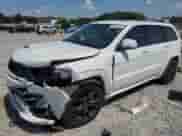 2017 Jeep Grand Cherokee SRT z VIN 1C4RJFDJXHC738652, wystawiony jako Copart lot #61984665 z przebiegiem 108 202 mil mil oraz Szkoda całkowita • Salvage title. Historia ofert i sprzedaży dostępna na DreamBid. Obrazek 1.