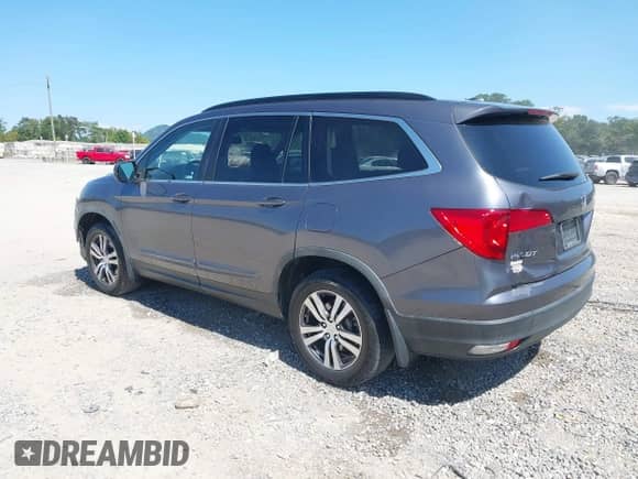 2018 Honda Pilot EX-L with VIN 5FNYF5H50JB006656, listed as a IAAI auction lot 43179982 with 130,515 mi miles and . Bid and sale history available at DreamBid. Image 3.