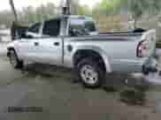 2004 Dodge Dakota Sport с VIN 1D7HL38K74S570546, выставлен на аукционе Copart как лот 49627955 с пробегом 237 321 миль миль и Списание • Salvage title. История ставок и продаж доступна на DreamBid. Изображение 2.