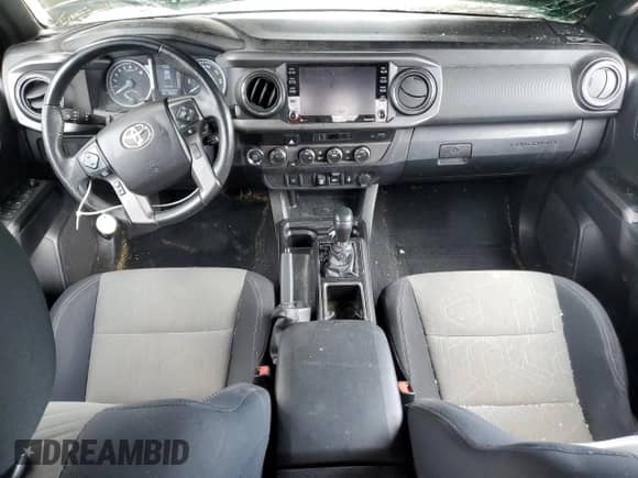 2022 Toyota Tacoma SR5 with VIN 3TMDZ5BN8NM127998, listed as a Copart auction lot 71539915 with 55,895 mi miles and Salvage title. Bid and sale history available at DreamBid. Image 8.