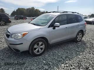 2014 Subaru Forester Limited z VIN JF2SJAHC7EH424473, wystawiony jako Copart lot #71002205 z przebiegiem 128 976 mil mil oraz Szkoda całkowita • Salvage title. Historia ofert i sprzedaży dostępna na DreamBid. Obrazek 1.