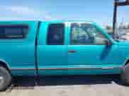 1995 GMC Sierra 1500 z VIN 2GTEC19K7S1506164, wystawiony jako IAAI lot #42595774 z przebiegiem 202 675 mil mil oraz . Historia ofert i sprzedaży dostępna na DreamBid. Obrazek 13.