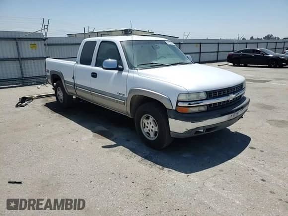 2000 Chevrolet Silverado 1500 LS z VIN 1GCEK19T4YE193674, wystawiony jako Copart lot #64790105 z przebiegiem 209 396 mil mil oraz Szkoda całkowita • Salvage title. Historia ofert i sprzedaży dostępna na DreamBid. Obrazek 13.