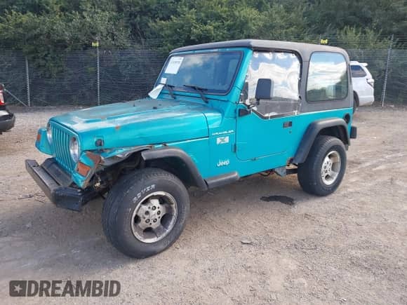 1997 Jeep Wrangler SE z VIN 1J4FY29P7VP447481, wystawiony jako IAAI lot #43438550 z przebiegiem 190 965 mil mil oraz . Historia ofert i sprzedaży dostępna na DreamBid. Obrazek 2.