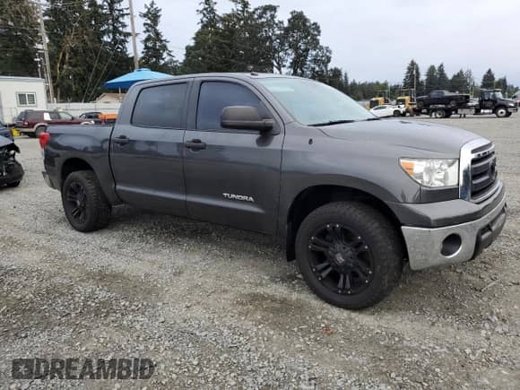 2013 Toyota Tundra with VIN 5TFDM5F1XDX044782, listed as a Copart auction lot 68907144 with 159,578 mi miles and Clean title. Bid and sale history available at DreamBid. Image 4.