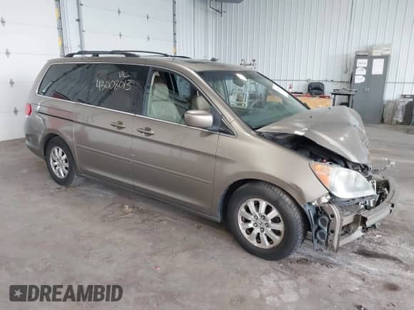 2008 Honda Odyssey EX-L with VIN 5FNRL38658B402974, listed as a IAAI auction lot 43008013 with 220,738 mi miles and . Bid and sale history available at DreamBid. Image 1.