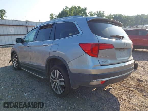 2017 Honda Pilot Elite with VIN 5FNYF6H09HB064057, listed as a IAAI auction lot 42933904 with 51,184 mi miles and . Bid and sale history available at DreamBid. Image 3.