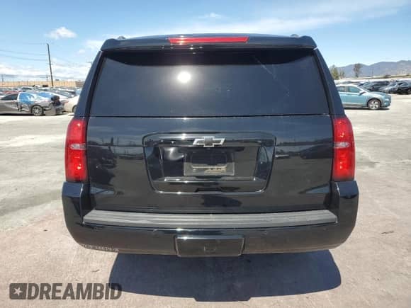 2019 Chevrolet Suburban LS with VIN 1GNSCGKC9KR258037, listed as a Copart auction lot 51495435 with 149,346 mi miles and Salvage title. Bid and sale history available at DreamBid. Image 6.