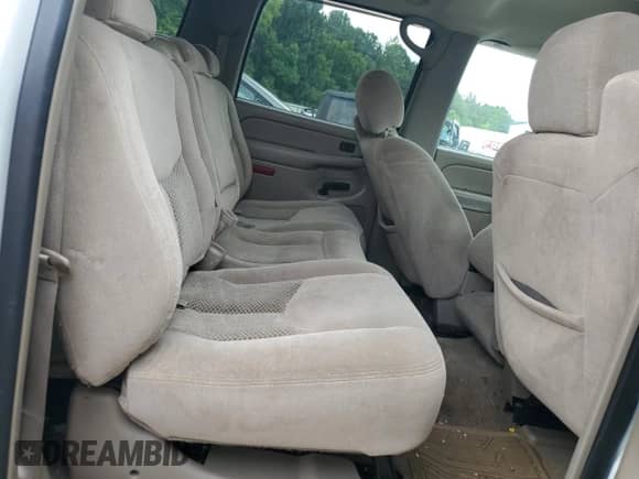 2004 Chevrolet Suburban LT with VIN 1GNEC16Z14J167421, listed as a Copart auction lot 69144245 with 247,325 mi miles and Salvage title. Bid and sale history available at DreamBid. Image 11.